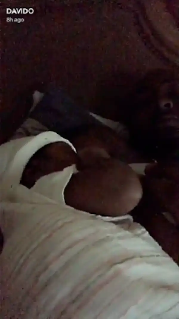 Daddy duties! Davido bottle feeds his newborn daughter, Hailey Veronica (photos)